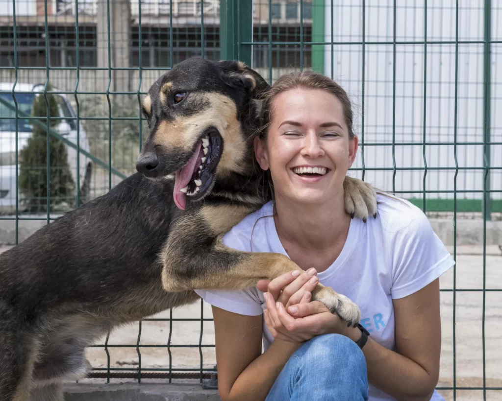 smiley woman dog adopt